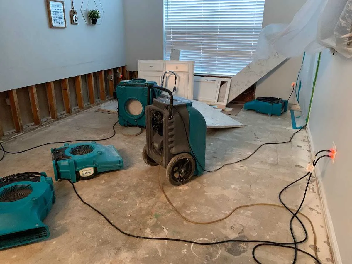 Dehumidifier in flood-cut room for Water Damage Restoration in Sherman